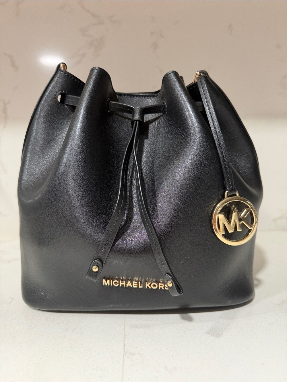 Michael Kors Black Leather Mini Drawstring Bucket Bag with Gold Hardware